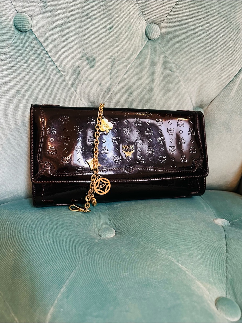 MCM Black Patent Leather Logo-Embossed Wristlet with Gold Chain